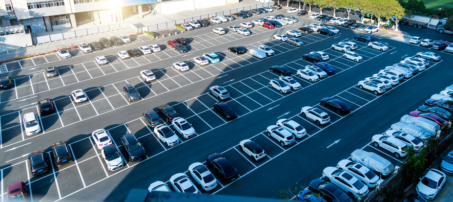 Aerial view of cars at outdoors parking lot, directly above view