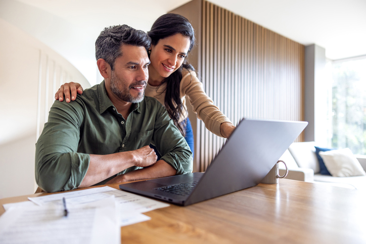 Loving couple organizing their home finances